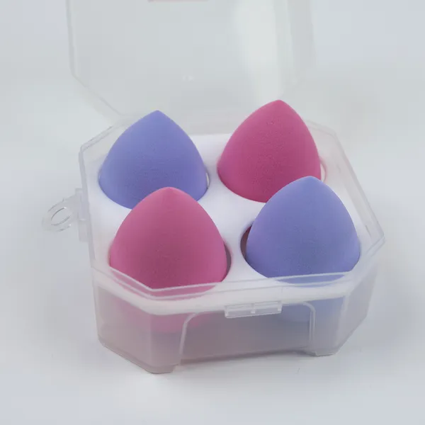 Vegan beauty blender sponges in pink and purple displayed in a PET box