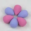 Vegan beauty blender sponges in pink and purple displayed in a PET box